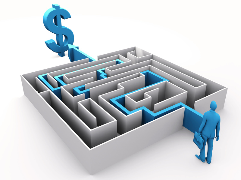 Businessman at the entrance of a labyrinth